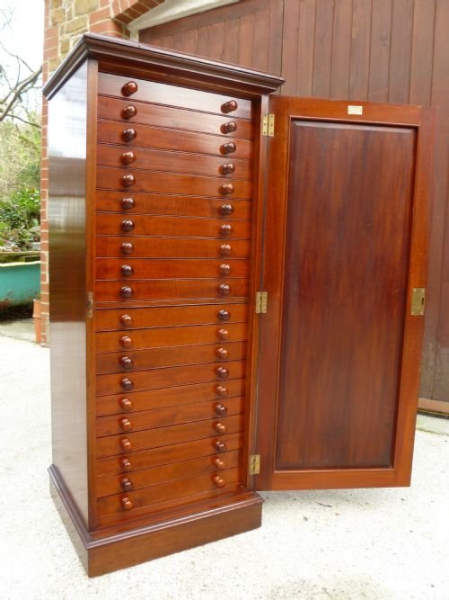 A Beautiful Victorian 20 Drawer, Solid Mahogany Collectors Cabinet by Messrs Watkins and Doncaster of the Strand, London.