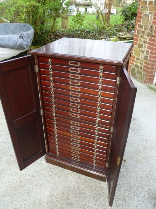 Fine Mahogany 20 Drawer Collectors Cabinet with Slide.