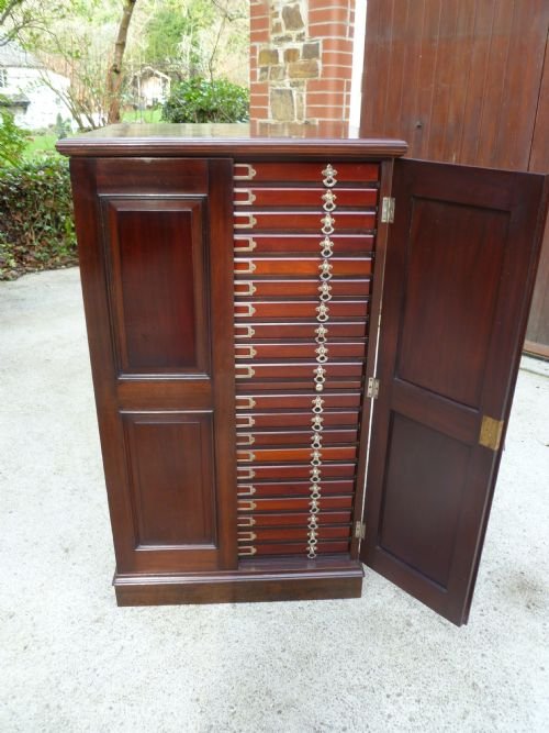 fig 1. FINE MAHOGANY 20 DRAWER COLLECTORS CABINET WITH SLIDE.