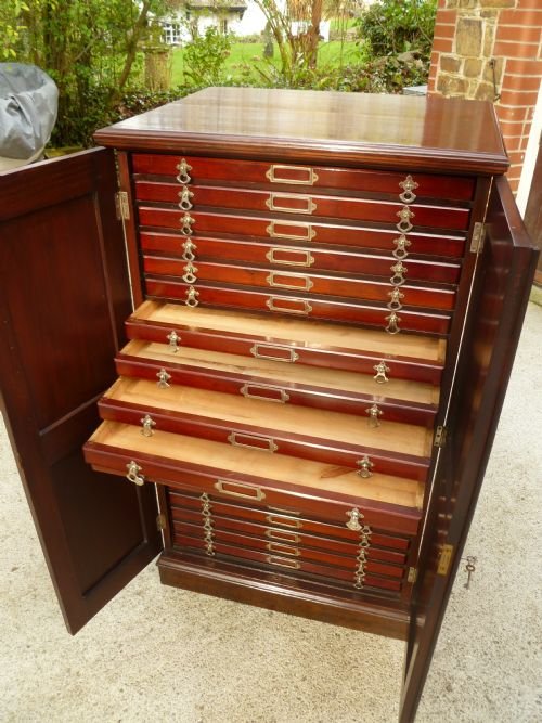 fig 4. FINE MAHOGANY 20 DRAWER COLLECTORS CABINET WITH SLIDE.