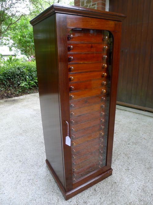 A Classic Victorian 20 Drawer Collectors Cabinet by Watkins and Doncaster of the Strand London