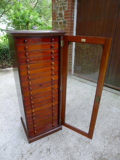 fig 1. A CLASSIC VICTORIAN 20 DRAWER COLLECTORS CABINET BY WATKINS AND DONCASTER OF THE STRAND LONDON