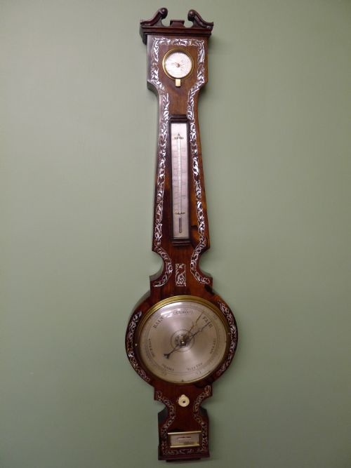 fig 1. A VERY FINE ROSEWOOD AND MOTHER OF PEARL INLAID FOUR GLASS WHEEL BAROMETER BY D.CATTANEO & CO OF LEEDS. CIRCA 1845.