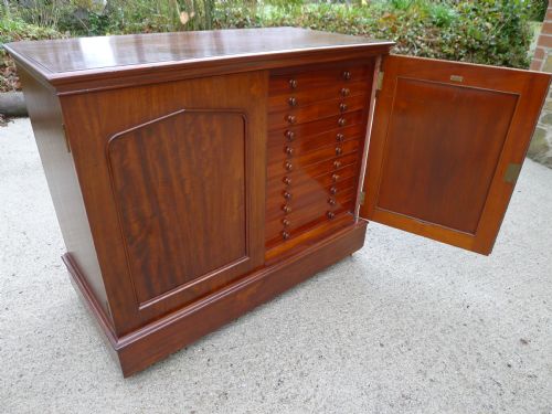 A Very Fine 22 Drawer Solid Mahogany Collectors Cabinet Supplied by Jansen of Great Russell Street. London.