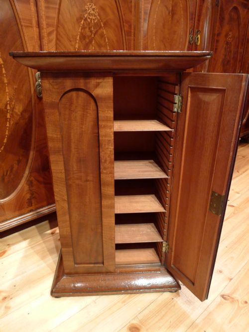 fig 2. A BEAUTIFULLY FIGURED, VICTORIAN HONDURAS MAHOGANY COLLECTORS CABINET USED FOR STORAGE OF MICROSCOPY EQUIPMENT CIRCA 1880