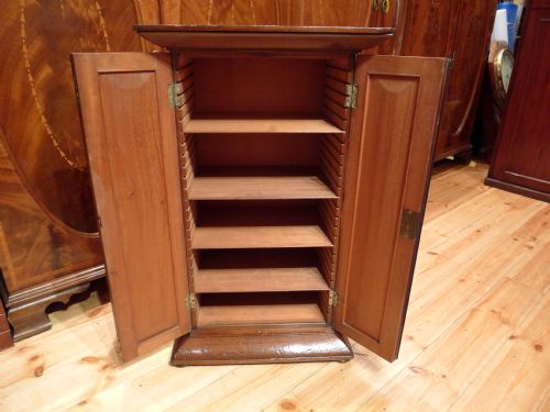 fig 3. A BEAUTIFULLY FIGURED, VICTORIAN HONDURAS MAHOGANY COLLECTORS CABINET USED FOR STORAGE OF MICROSCOPY EQUIPMENT CIRCA 1880