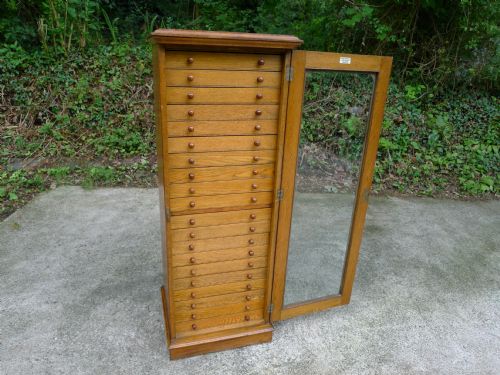 fig 1. OAK 20 DRAWER COLLECTORS CABINET BY WATKINS AND DONCASTER, 36 THE STRAND, LONDON W.C.