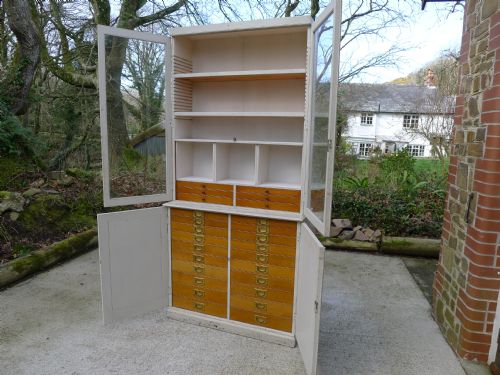 A Superb Painted Collectors Cabinet or Dresser with 26 Oak Drawers and Adjustable Shelving and Pigeon Holes.circa 1900.