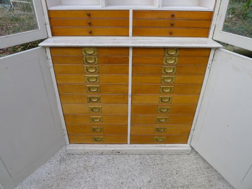 fig 3. A SUPERB PAINTED COLLECTORS CABINET OR DRESSER WITH 26 OAK DRAWERS AND ADJUSTABLE SHELVING AND PIGEON HOLES.CIRCA 1900.