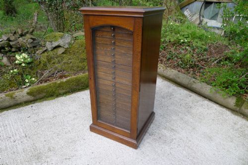 An Oak 20 Drawer Collectors Cabinet by Jansen of London Circa 1900.