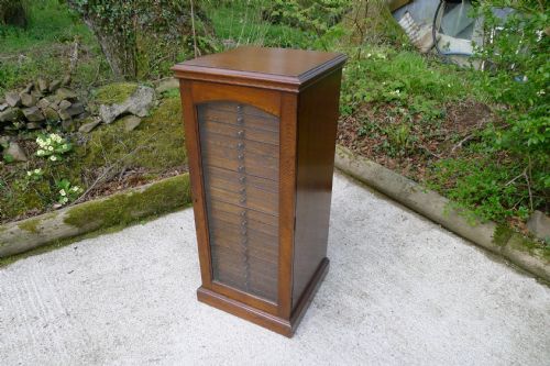 fig 2. AN OAK 20 DRAWER COLLECTORS CABINET BY JANSEN OF LONDON CIRCA 1900.