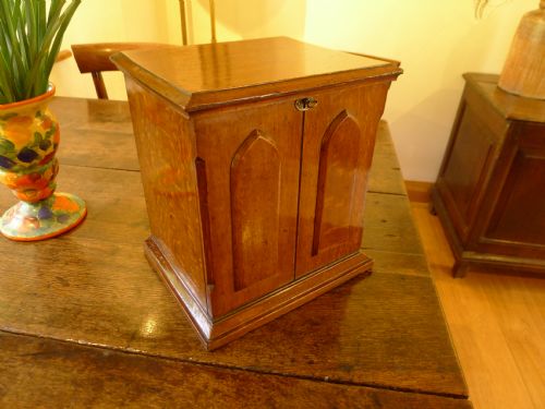 fig 1. A VICTORIAN OAK STATIONARY AND WRITING CABINET. CIRCA 1880.