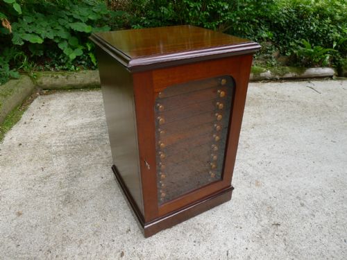 fig 1. A 12 DRAWER COLLECTORS CABINET IN MAHOGANY AND SATIN WALNUT BY MESSRS WATKINS AND DONCASTER CIRCA 1900