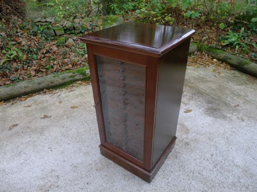fig 1. A GOOD 16 DRAWER SATIN WALNUT AND MAHOGANY COLLECTORS CABINET BY WATKINS AND DONCASTER THE STRAND, LONDON. CIRCA 1910.