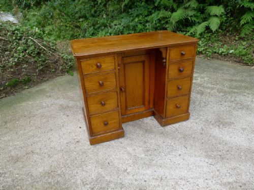 A Very Small, Victorian, Golden Oak Kneehole Desk. Circa 1880