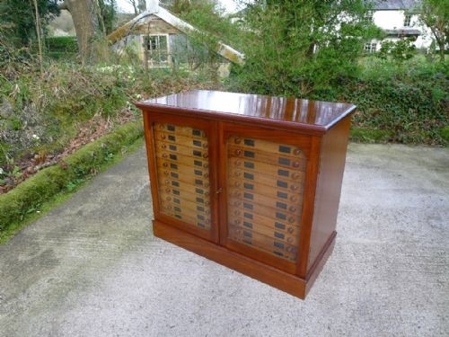 fig 1. A 24 DRAWER MAHOGANY COLLECTORS CABINET BY WATKINS AND DONCASTER OF LONDON. CIRCA 1900.