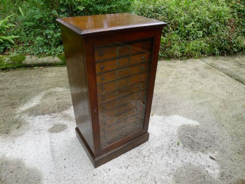 fig 1. A 12 DRAWER COLLECTORS CABINET IN STAINED AND POLISHED DEAL BY GARDNER OF OXFORD STREET. LONDON. CIRCA 1890.