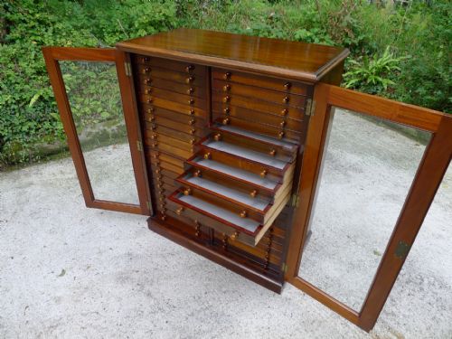 A Good Edwardian 40 Drawer Collectors Cabinet in Satin Walnut and Mahogany by Messrs Watkins & Doncaster.  Circa 1920