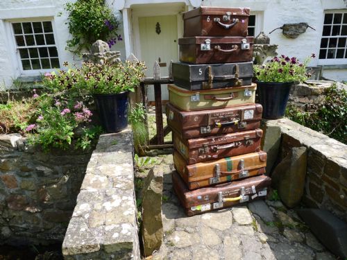8 Vintage Cases Including Leather Cartridge Case and a De-mob Suitcase
