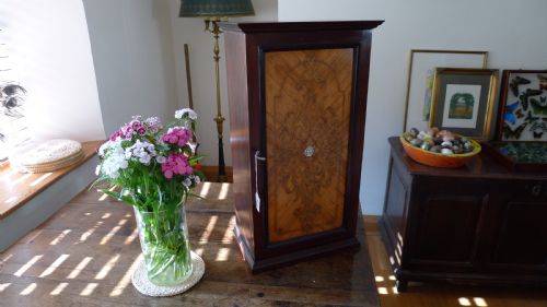 fig 2. A SUPERB COLLECTORS CABINET IN MAHOGANY AND WALNUT WITH CEDER LINED DRAWERS. CIRCA 1886.