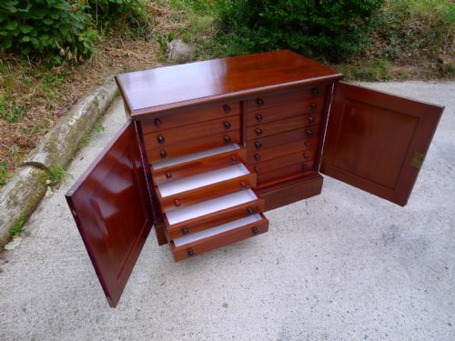 A Fine Mahogany 14 Drawer Collectors Cabinet. Circa 1870.