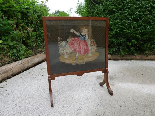 A Beautiful Petit Point Embroidered Tapestry Walnut Framed Fire Screen Circa 1880.