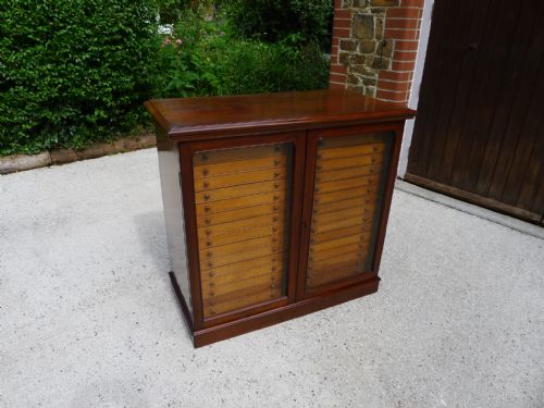 An Excellent 32 Drawer Solid Mahogany Collectors Cabinet by Watkins and Doncaster, the Strand, London. Circa 1890.