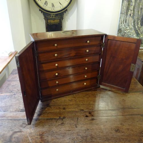 A George III Mahogany Collectors Cabinet. Circa 1790.