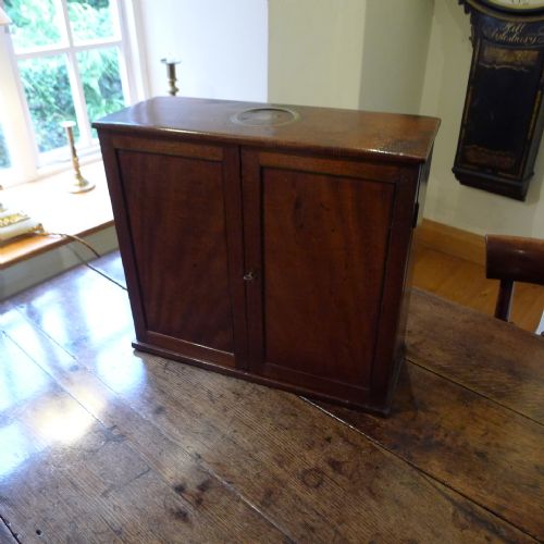 fig 1. A GEORGE III MAHOGANY COLLECTORS CABINET. CIRCA 1790.