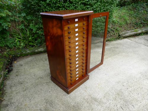 fig 1. A SOLID MAHOGANY 16 DRAWER VICTORIAN COLLECTORS CABINET CONTAINING A SPECTACULAR COLLECTION OF BRITISH MOTHS. CIRCA 1900.