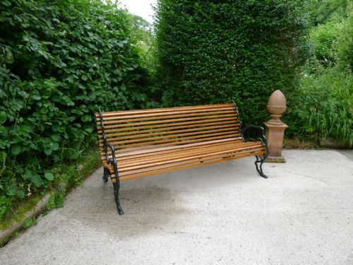 A FINE VICTORIAN GARDEN SEAT CIRCA 1880