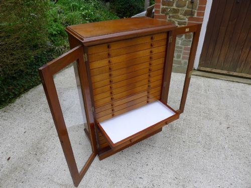 A Super Watkins & Doncaster Butterfly Collectors Cabinet in English Walnut and Mahogany Circa 1900. 18 Wide Drawers.