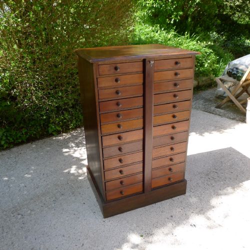 fig 1. A GOOD 12 DRAWER OOLOGICAL GRADUATED EGG COLLECTORS CABINET IN SATIN WALNUT AND DEAL CIRCA 1890.