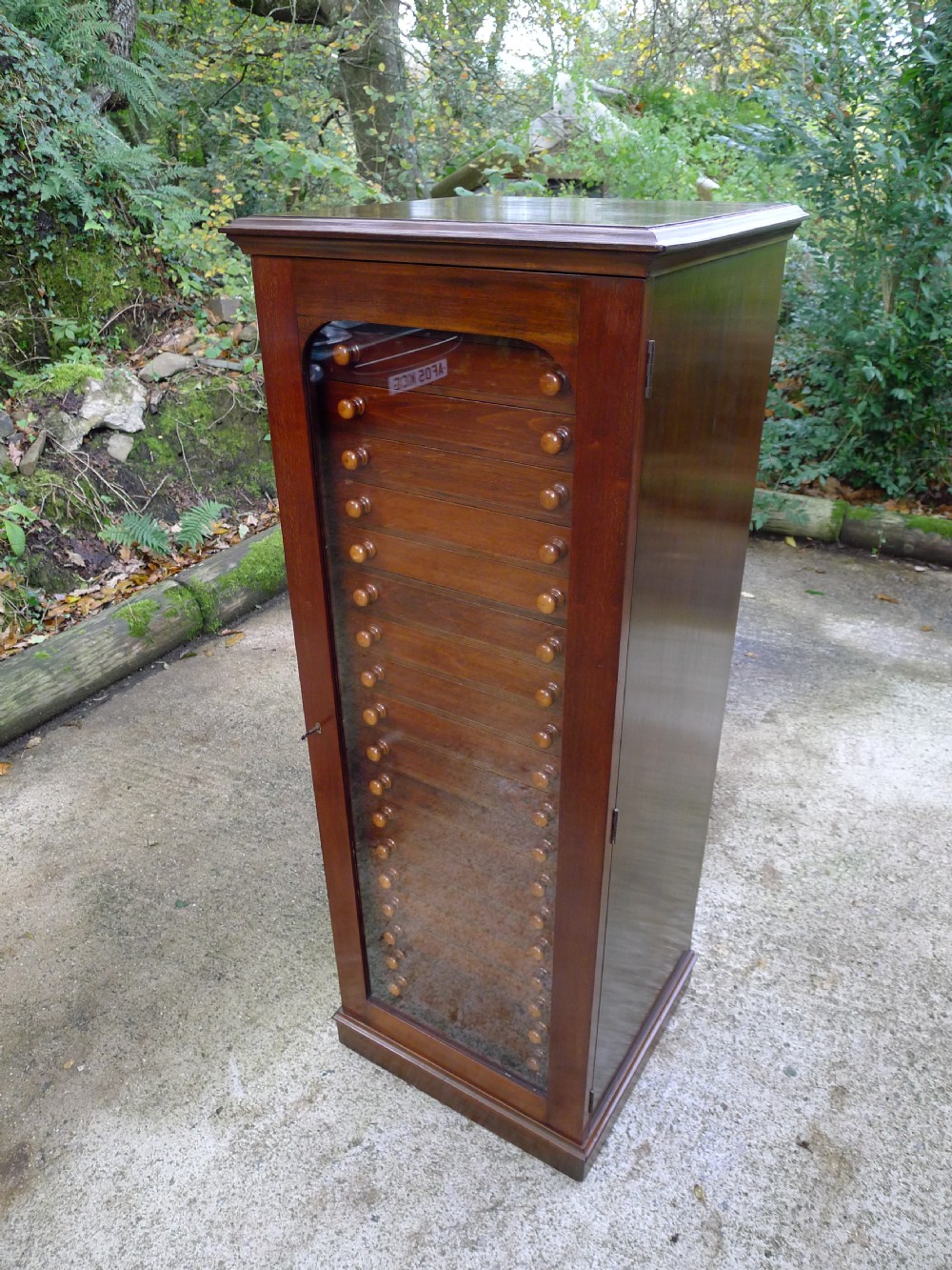 A 20 DRAWER SATIN WALNUT AND MAHOGANY COLLECTORS CABINET BY MESSRS WATKINS AND DONCASTER OF THE STRAND, LONDON. W. CIRCA 1890.