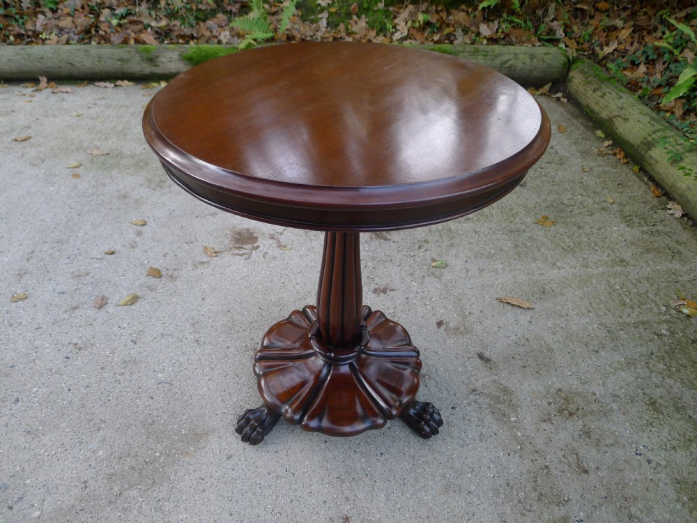 A FINE VICTORIAN MAHOGANY WINE TABLE WITH CARVED BASE AND FLUTED COLUMN. CIRCA 1870.