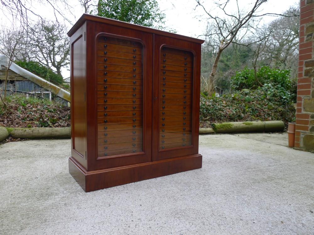 FOR THE CONNOISSEUR, THE ULTIMATE 40 DRAWER COLLECTORS CABINET BY THOMAS GURNEY. CIRCA 1880.
