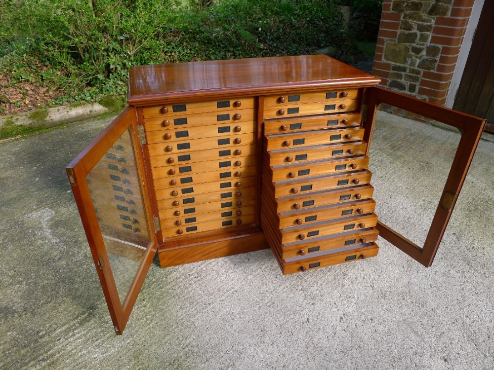 A 24 DRAWER MAHOGANY COLLECTORS CABINET BY WATKINS AND DONCASTER OF LONDON. CIRCA 1900.