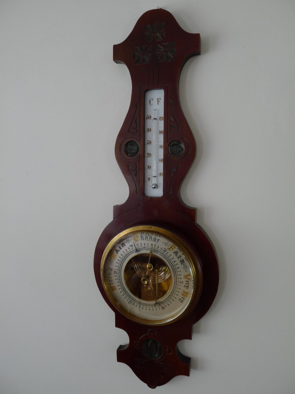 A GOOD 'ARTS AND CRAFTS' PERIOD ANEROID BAROMETER. CIRCA 1900.