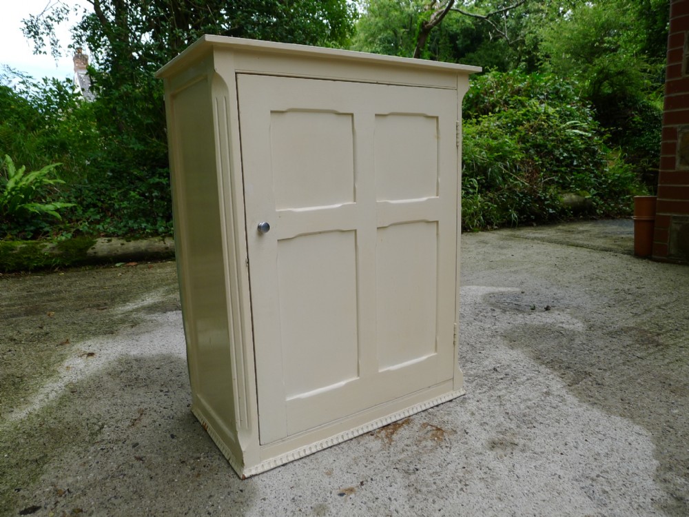 A PAINTED PINE AND PLY BATHROOM OR OTHER CABINET IN GOOD ORDER. CIRCA 1920