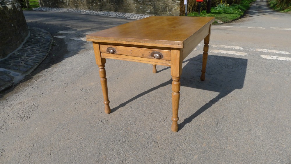 A PINE WEST COUNTRY FARMHOUSE KITCHEN TABLE WITH DRAWER. CIRCA 1890.  View V