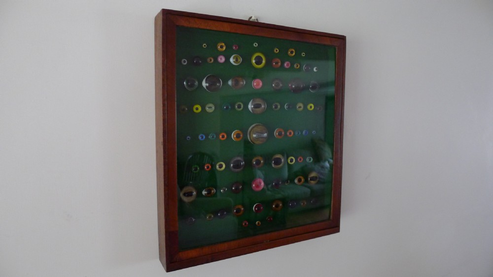 AN ANTIQUE WALL CASE CONTAINING A DISPLAY OF 77 VICTORIAN TAXIDERMY GLASS EYES. View V