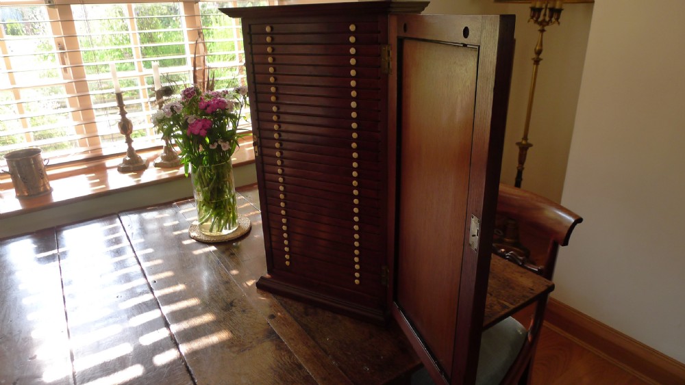 A SUPERB COLLECTORS CABINET IN MAHOGANY AND WALNUT WITH CEDER LINED DRAWERS. CIRCA 1886. View VII