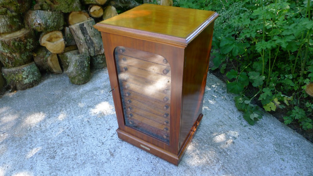A GOOD MAHOGANY 12 DRAWER COLLECTORS CABINET BY WATKINS & DONCASTER LATE OF THE EMMINENT ENTOMOLOGIST P.W.CRIBB. View II