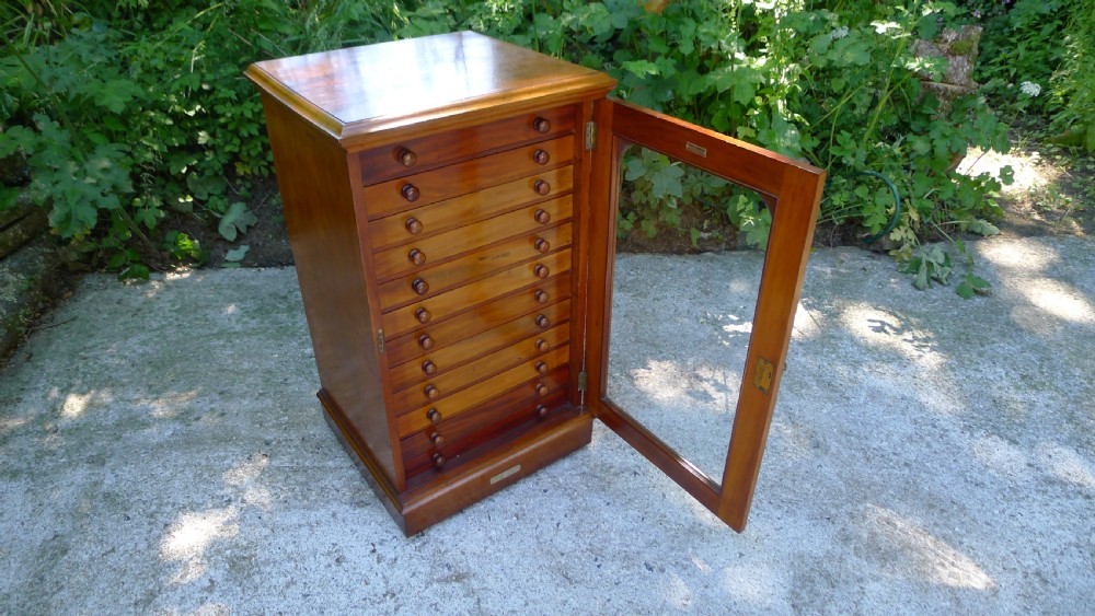 A GOOD MAHOGANY 12 DRAWER COLLECTORS CABINET BY WATKINS & DONCASTER LATE OF THE EMMINENT ENTOMOLOGIST P.W.CRIBB. View VII