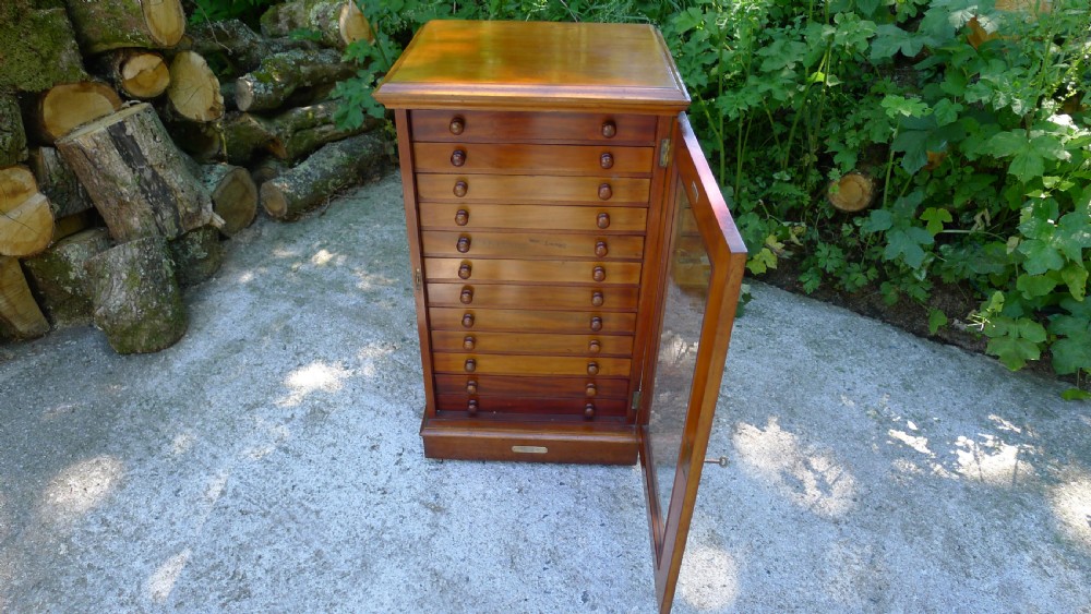 A GOOD MAHOGANY 12 DRAWER COLLECTORS CABINET BY WATKINS & DONCASTER LATE OF THE EMMINENT ENTOMOLOGIST P.W.CRIBB. View VIII