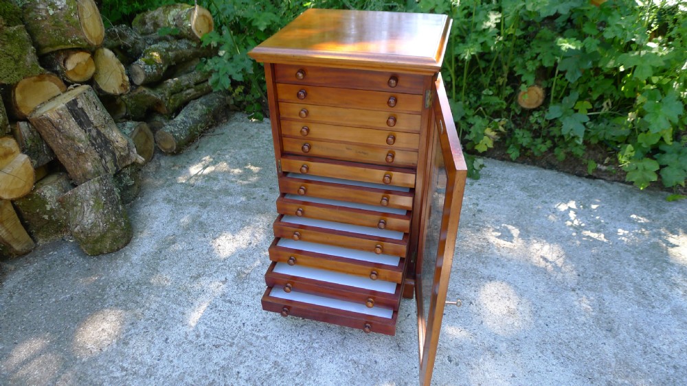 A GOOD MAHOGANY 12 DRAWER COLLECTORS CABINET BY WATKINS & DONCASTER LATE OF THE EMMINENT ENTOMOLOGIST P.W.CRIBB. View XI