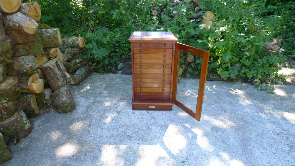 A GOOD MAHOGANY 12 DRAWER COLLECTORS CABINET BY WATKINS & DONCASTER LATE OF THE EMMINENT ENTOMOLOGIST P.W.CRIBB. View XV