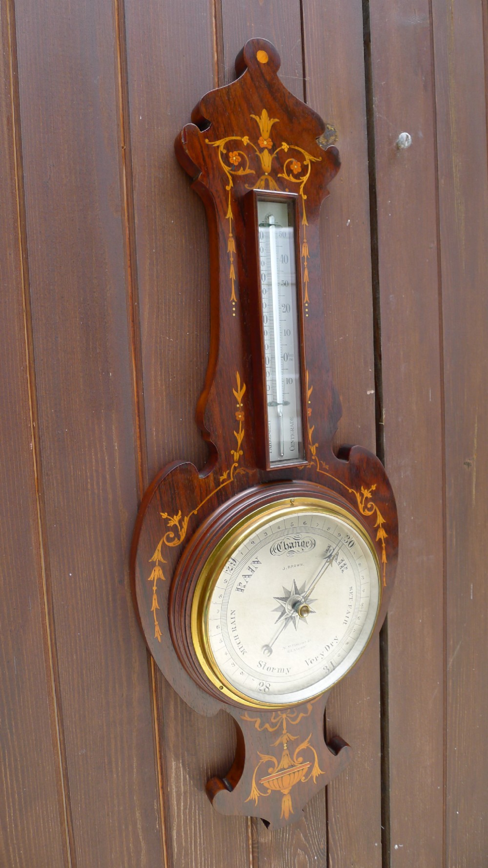 A BEAUTIFUL ART NOUVEAU WALL HANGING ANEROID WHEEL BAROMETER CIRCA 1895. View III