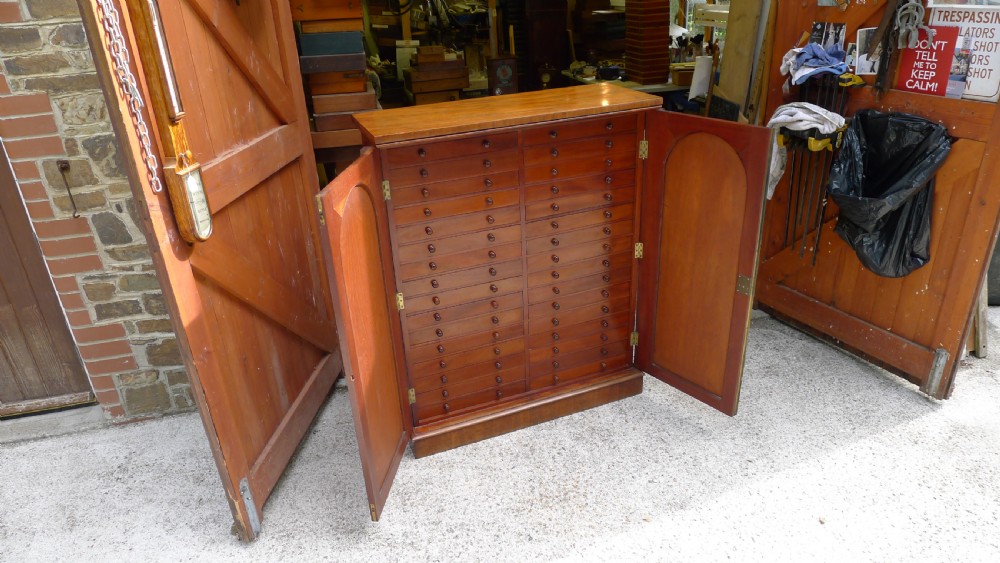 A FINE WILLIAM IV MAHOGANY COLLECTORS CABINET WITH COLLECTION. CIRCA 1840. View X