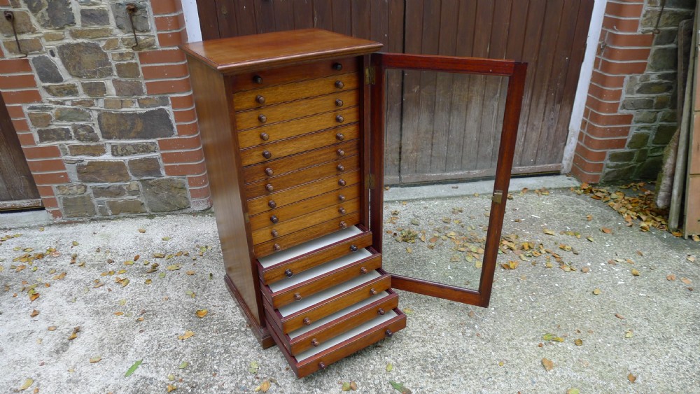 A GOOD AND VERSATILE 16 DRAWER COLLECTORS CABINET LATE OF P.W.CRIBB. CIRCA 1930.
